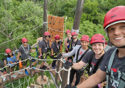 Photo of Jesus Gonzalez and the ARC team on a ropes course