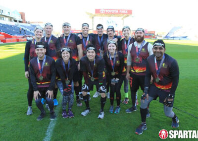 Photo of John Thompson and the ARC team at the Spartan Race