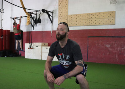 Photo of Sean McCormick doing squats.